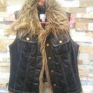 Medium faux lined leather Vest.